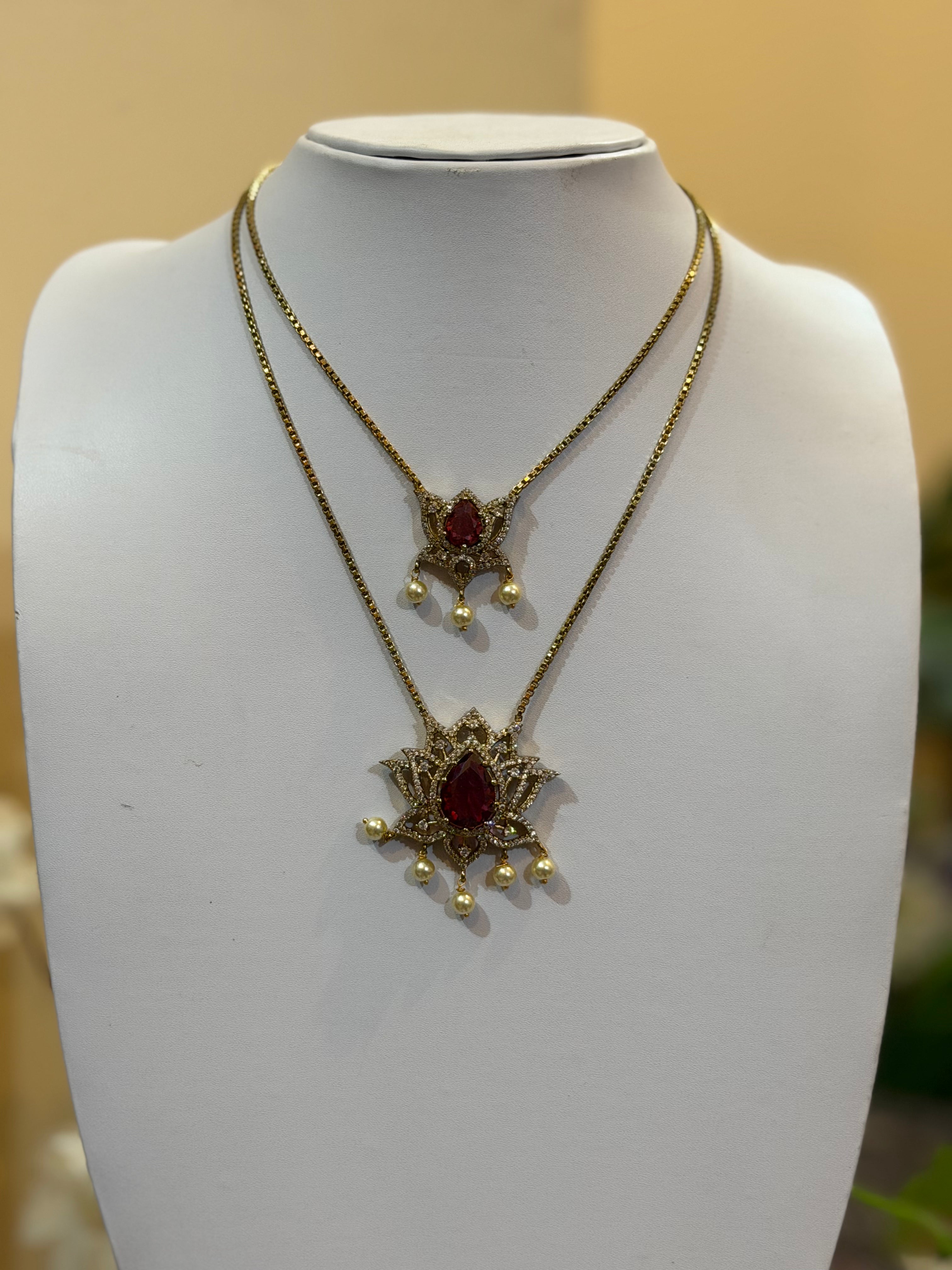 AD pushpa Layered Pendant Necklace
