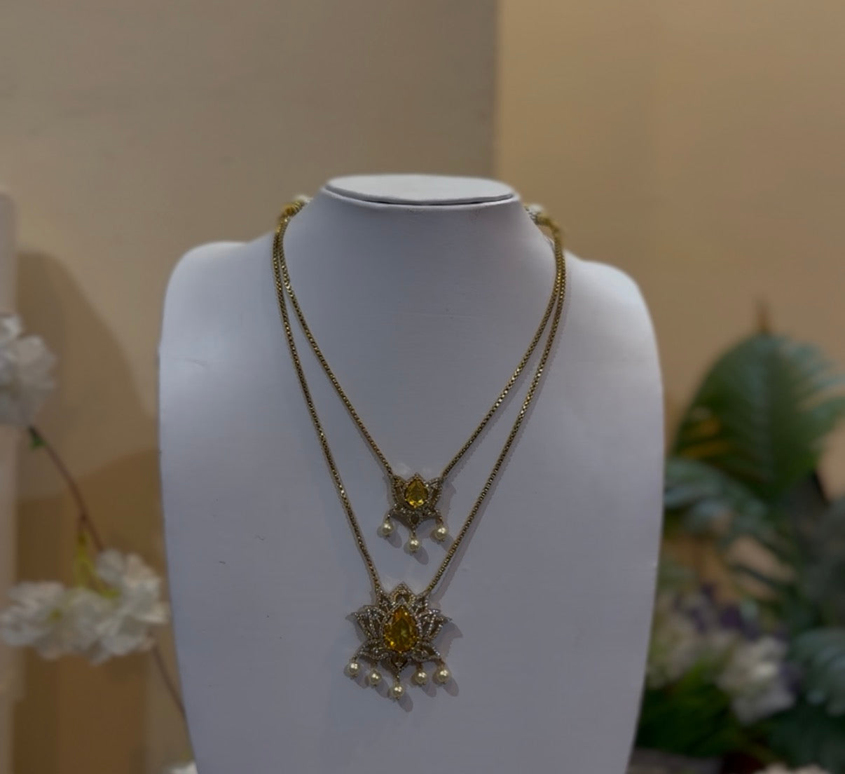 AD pushpa Layered Pendant Necklace