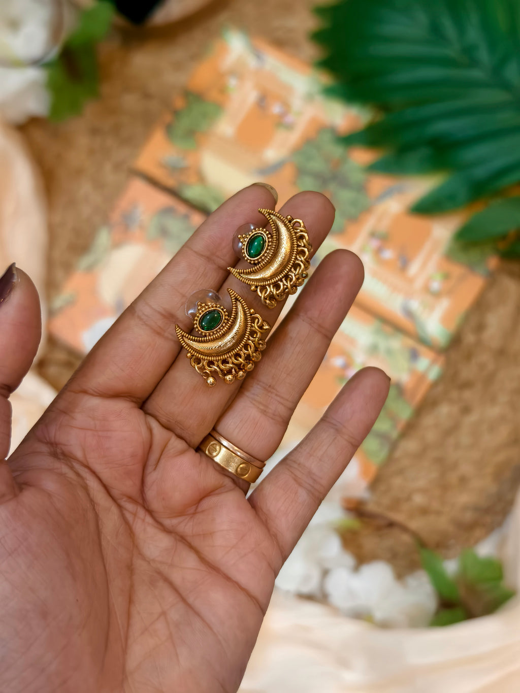 Moon with golden beads