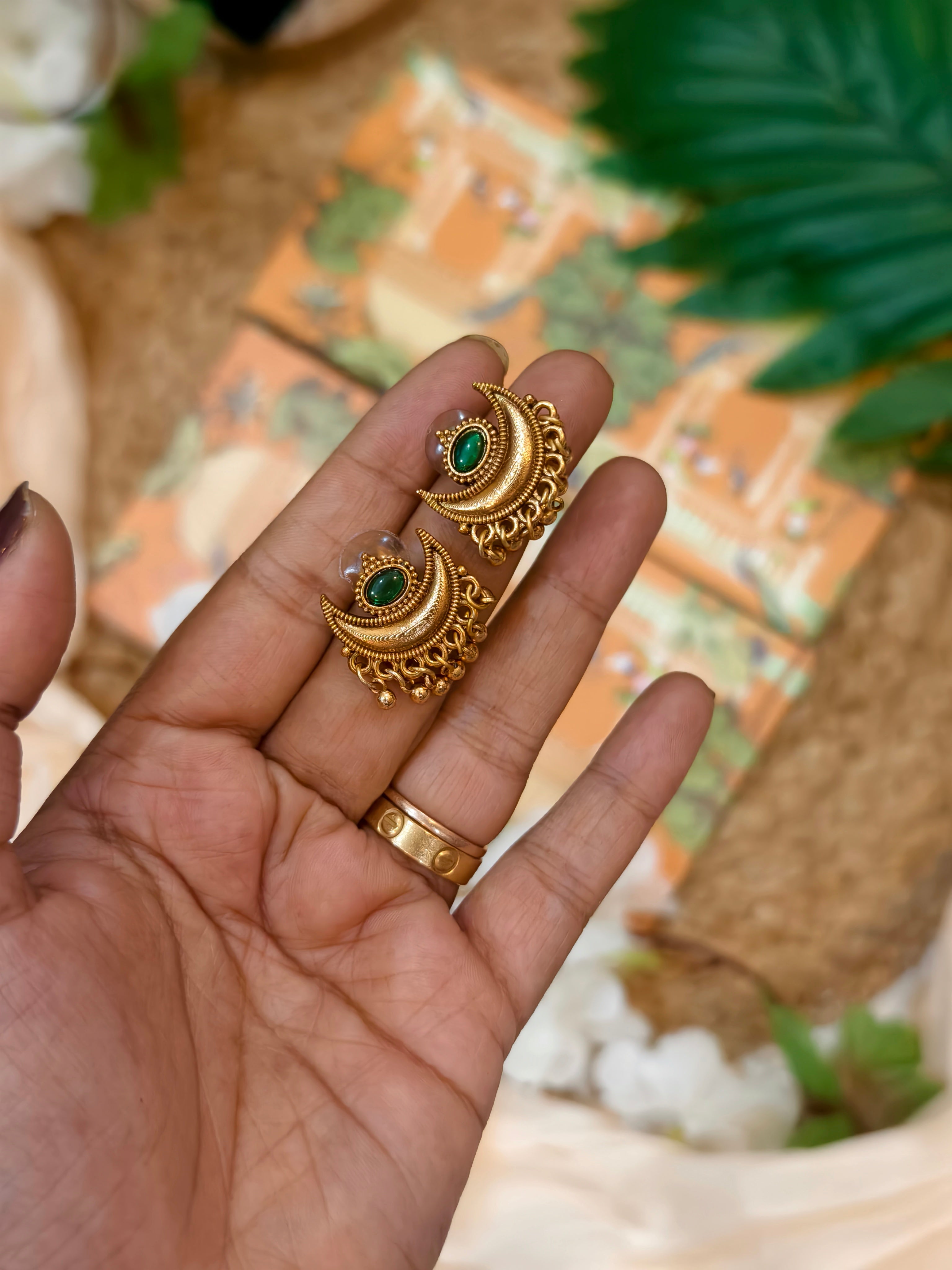 Moon with golden beads